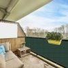 product-fancy-1ad6d69f-9201-461a-b0a9-a3b8f9ea758d Dark Green Privacy Screen for Balconies, Designed to Shield Against And Sun, Featuring Eyelets for Easy Installation. Ideal for Decks, Patios, Backyards, Pools, And Porches (1pc)