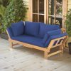 Outdoor Seating Arrangement Featuring a Wooden Sofa Bed with Adjustable Settings, Complete with Plush Cushions, Ideal for Two Individuals, Perfect for Small Spaces Like Balconies, Backyards, Or by The Pool