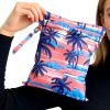 product-fancy-2e2a41c9-0385-4178-81aa-7d1968914a5c Reusable Wet Storage Bag with Tropical Palm Print Pattern, Designed for Diaper Storage. Dimensions: 9.84in*12.2in. Perfect for Storing Swimwear, Travel Essentials, Beach Items, and Pool Supplies. Ideal for Themed Gifts and Holiday Presents