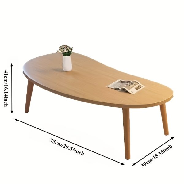 product-fancy-49033ecc-b698-4fd9-866c-fd9418e863ad Natural Wood Grain Oval Coffee Table, Irregular Solid Wood Top Shows Unique Beauty. Slim Legs Create Lightweight Visual. Cozy Companion for Living Room Reading Nook. Holds Vase And Magazines Displaying Lifestyle. Modern Minimalist Home Core Piece