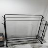 product-fancy-5e487ae0-b8ac-49d2-a8ba-c311f2567111 Durable Metal Hanger With Double Poles And Wheels, Equipped With Shelves And Hooks, A Multifunctional Wardrobe Solution Suitable For Independent Metal Hangers In Bedrooms, Laundry Rooms, And Living Rooms.