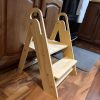 product-fancy-6da47295-efe0-4e6e-b011-0194487ecfc7 Children's Step Stool, Foldable Anti-Slip Double-Tier Step Stool with Handle Design, Suitable for Multiple Settings Including Bathroom Sinks, Kitchens, And Bedroom Countertops