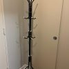 product-fancy-7895ffb6-ac95-4309-a9f4-57524ae8d85a 1pc Heavy-Duty Metal Coat Rack with 9-Tier Vertical Storage - Freestanding Space-Saving Clothing Organizer with Sturdy Iron Frame & Copper Finish, 27"+ Height, Easy Assembly for Entryway, Living Room, Bedroom, Dorm - Portable Garment Rack for Shirts