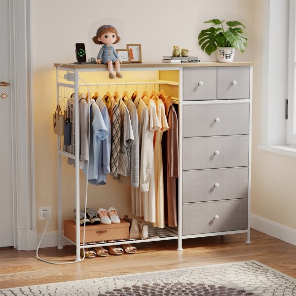 product-fancy-796ed136-02b8-427b-a15c-b525e416e689 Dresser with LED Lights And Charging Station for Bedroom - 6-Drawer Fabric Storage Dresser with Hanging Rack, Sturdy Wooden Top, Stable Anti-Tip Design, Perfect for Modern Homes & Apartments