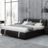 Contemporary Platform Bed Frame Made of Faux Leather, Featuring Iron Metal Accents, an Adjustable Headboard, And Wooden Slats for Support, Eliminating The Need for a Box Spring