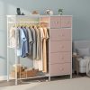 product-fancy-b6e73f52-9706-4056-8c84-ce837899e622 Dresser with LED Lights And Charging Station for Bedroom - 6-Drawer Fabric Storage Dresser with Hanging Rack, Sturdy Wooden Top, Stable Anti-Tip Design, Perfect for Modern Homes & Apartments