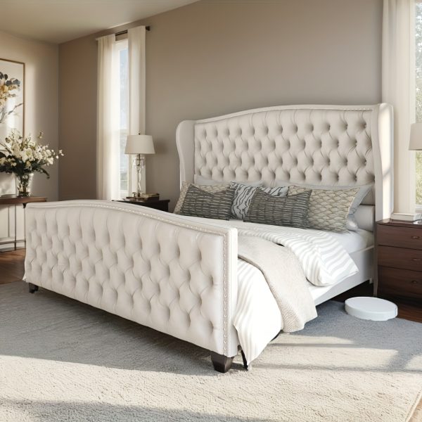 product-fancy-cfb15c3d-9bb5-4fae-8007-917c83007d90 Handcrafted Velvet Bed Frame Featuring a Wingback Headboard, Adorned with Button Tufting And Nailhead Accents, Supported by Wooden Slats.