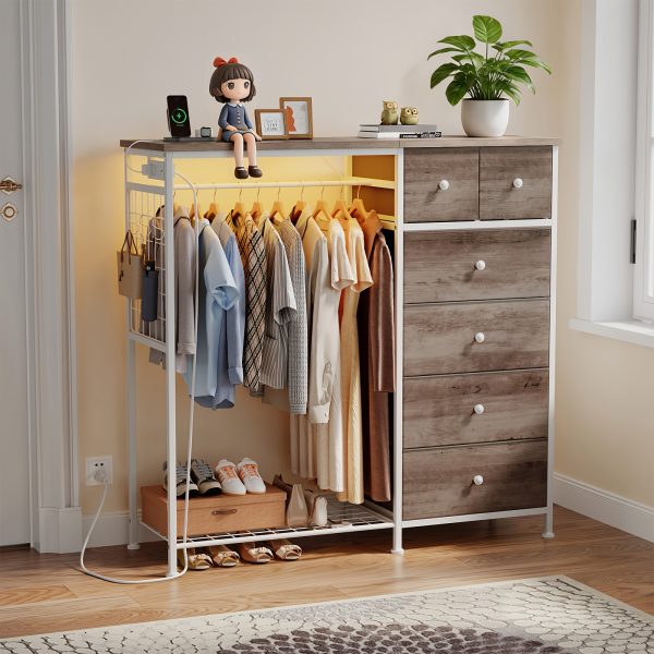 product-fancy-dbe10bac-a0bb-4c1b-acb4-90a6abd897e6 Dresser with LED Lights And Charging Station for Bedroom - 6-Drawer Fabric Storage Dresser with Hanging Rack, Sturdy Wooden Top, Stable Anti-Tip Design, Perfect for Modern Homes & Apartments
