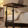 product-fancy-f8fc2139-3a59-4854-8b2a-2158232acc90 Adjustable Rolling Bedside Table with Wheels | C-Shaped Laptop Desk for Bed And Sofa, Small Mobile Overbed Table with Storage Shelves, Height Adjustable Nightstand for Home, Office And Living Room