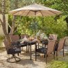 product-open-ed15855031fc4d91804891b87a346996-goods Andehomy 7pcs Patio Dining Set with 6 Chairs And 1 Table, Outdoor Dining Set with 2 Wicker Swivel Patio Dining Chairs with Cushions & Black, Rectangular Woodgrain Metal Dining Table with 1.75" Umbrella Hole, Black & Brown